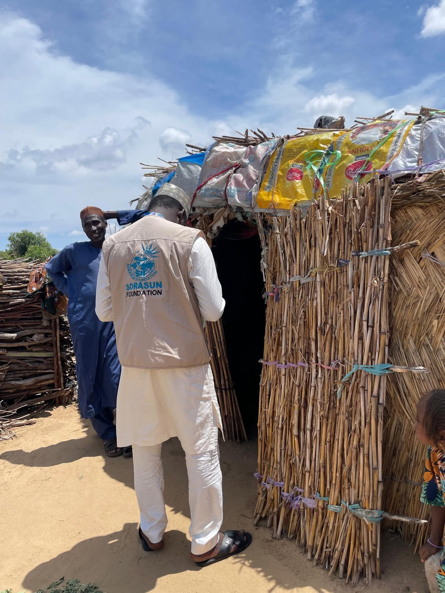 Field staff engaging with a community member